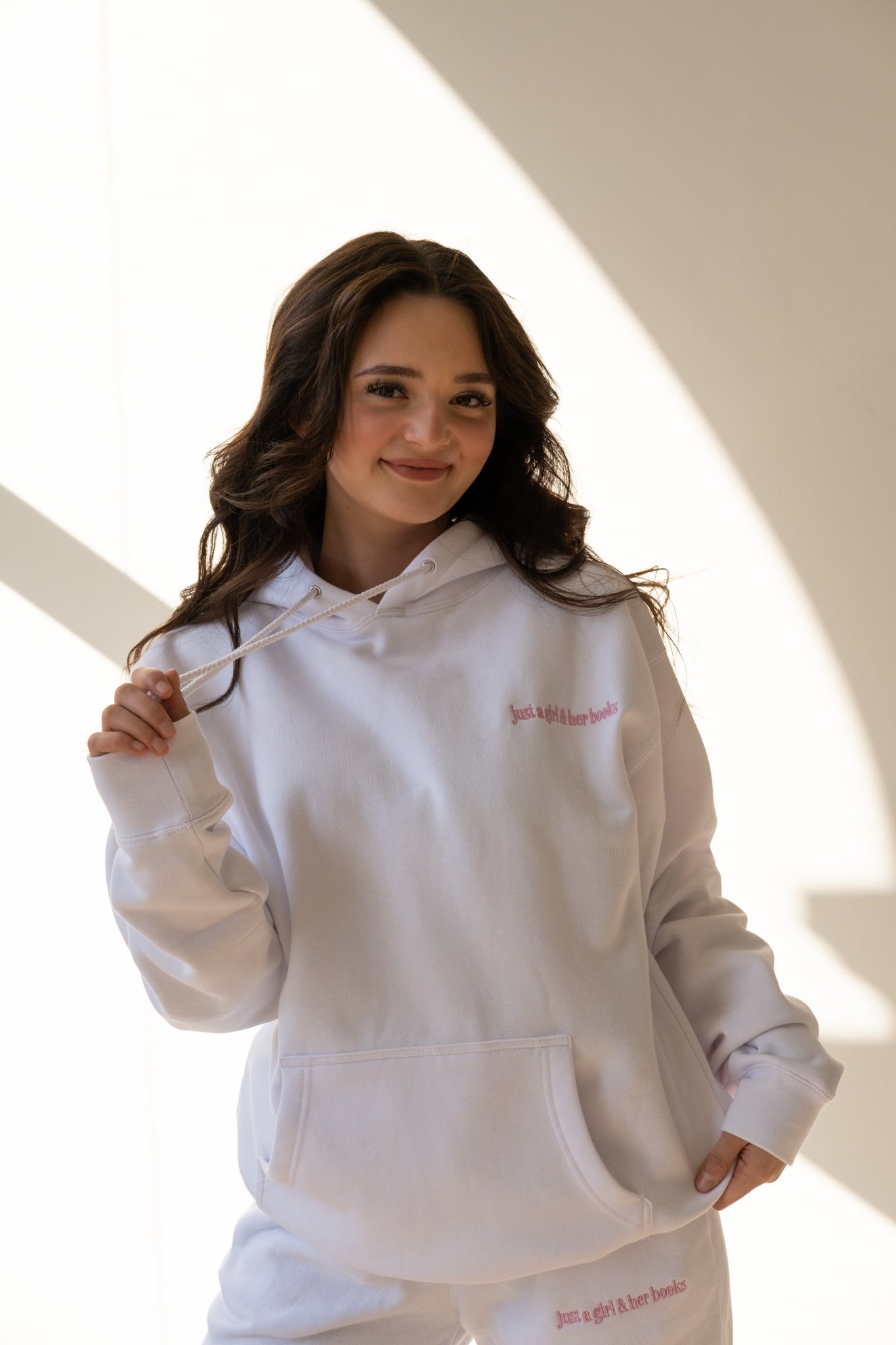 Book lover Alexa in a cozy white just a girl & her books hoodie